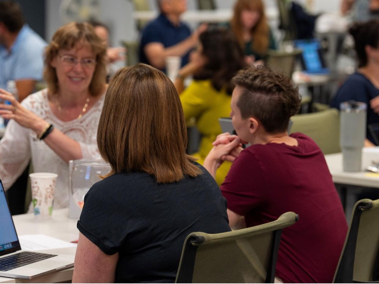 Penn State faculty and staff attending a Teaching and Learning with Technology workshop focused on generative AI (artificial intelligence) in teaching practices. Credit: TLT. All Rights Reserved.